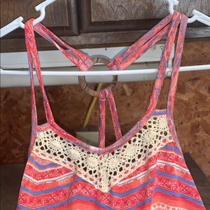 Different colored razor back tank. Super cute! No boundaries brand. Size M (7-9)